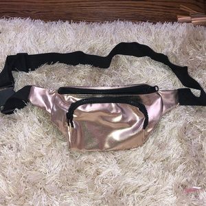 Never worn rose gold fany pack